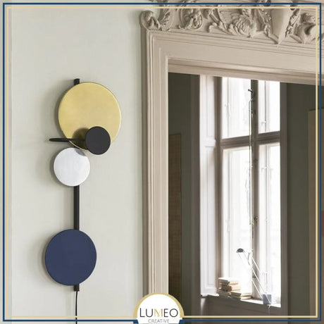 Applique murale graphique à disques colorés