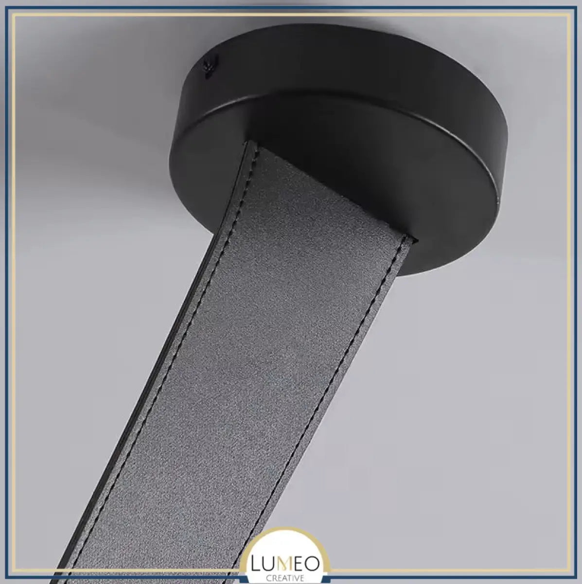 Lustre suspendu design à sangles de cuir et globes en verre