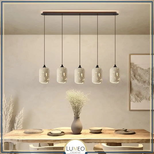 Suspension en pierre naturelle ajourée | Artisanale & Sculpturale