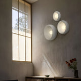 Applique murale disque texturée | Luminaire artistique en relief