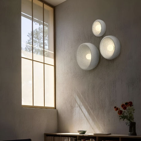Applique murale disque texturée | Luminaire artistique en relief