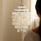 Lustre design en coquillages naturelles