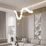 Lustre doré orné de perles en verre opalin | Luminaire chic