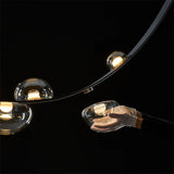 Lustre suspendu design à sangles de cuir et globes en verre