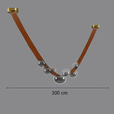 Lustre suspendu design à sangles de cuir et globes en verre Marron 3 mètres / Gris fumé / Blanc froid