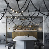 Lustre suspendu design à sangles de cuir et globes en verre