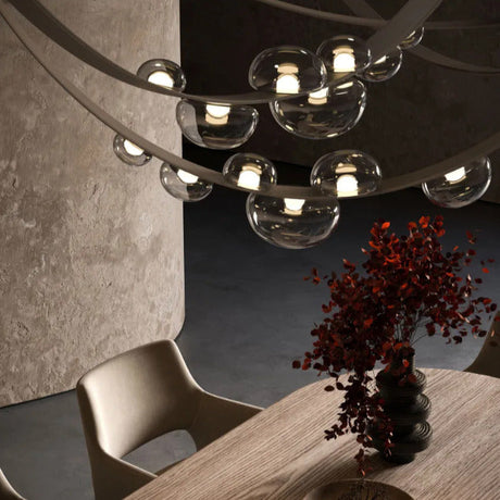Lustre suspendu design à sangles de cuir et globes en verre