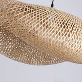 Suspension design en rotin tressé | Forme organique et chaleureuse
