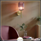 applique murale dorée et verre terracotta violet au style retro chic