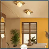 plafonnier doré en cuivre et verre dépoli salle à manger