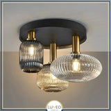 plafonnier en verre noir et or