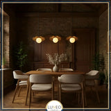 suspension antique en cuivre et boule de verre pour interieur rustique