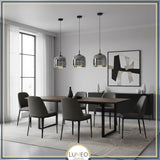 suspension design en verre teinté et fumé gris intense et à LED dans une salle à manger