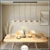 suspension luminaire salle à manger travertin et bois